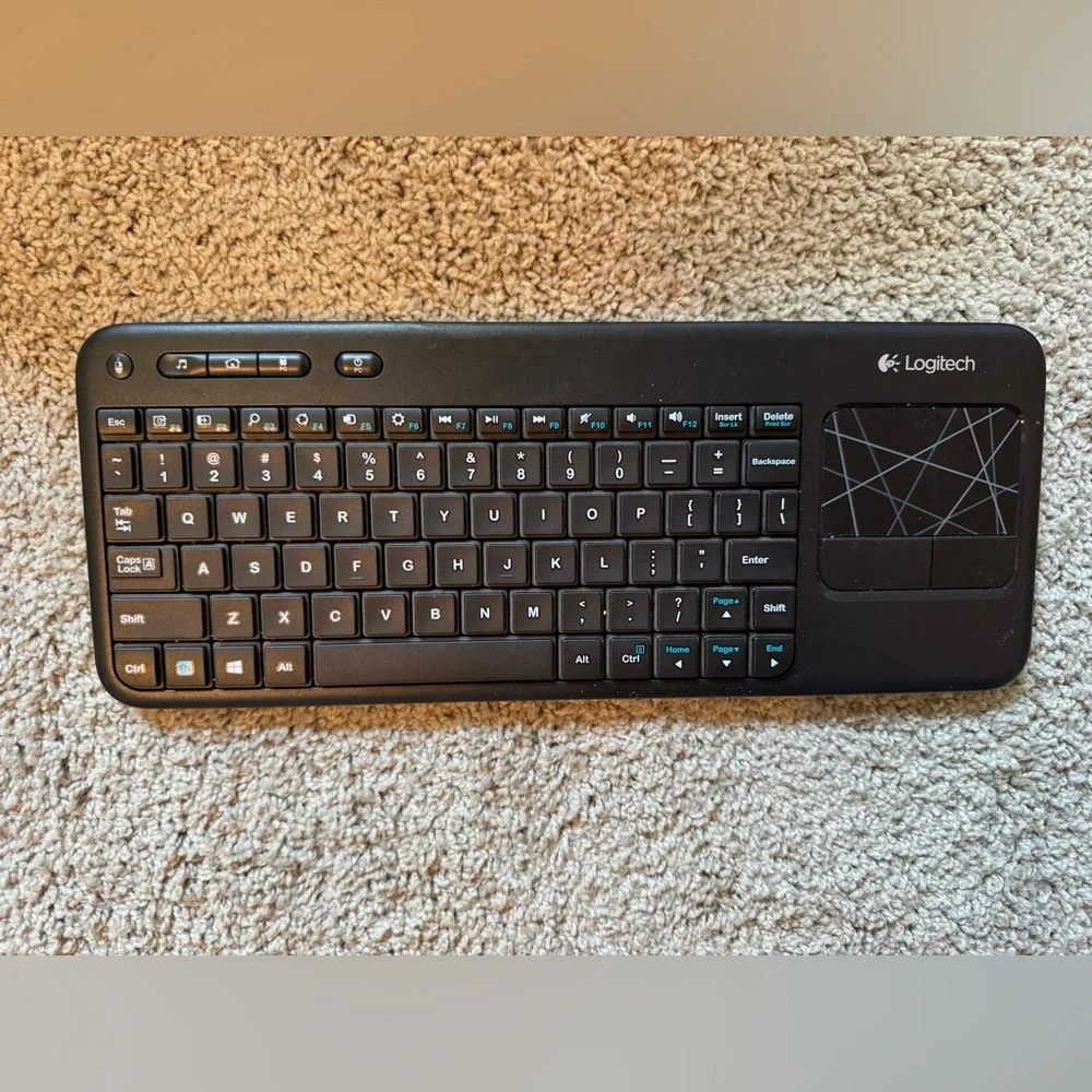 Logitech Black Compact Wireless Keyboard with Built‑in Touchpad